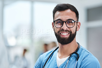 Buy stock photo Portrait of a young medical practitioner standing in a hospital