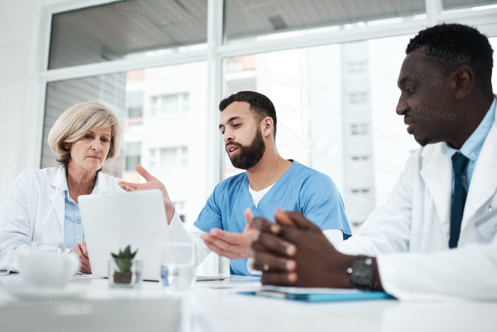 Buy stock photo Doctor, people and laptop with meeting in boardroom for healthcare diagnosis, surgery planning and medical workshop. Medicine, professional and team with technology for health assessment or treatment