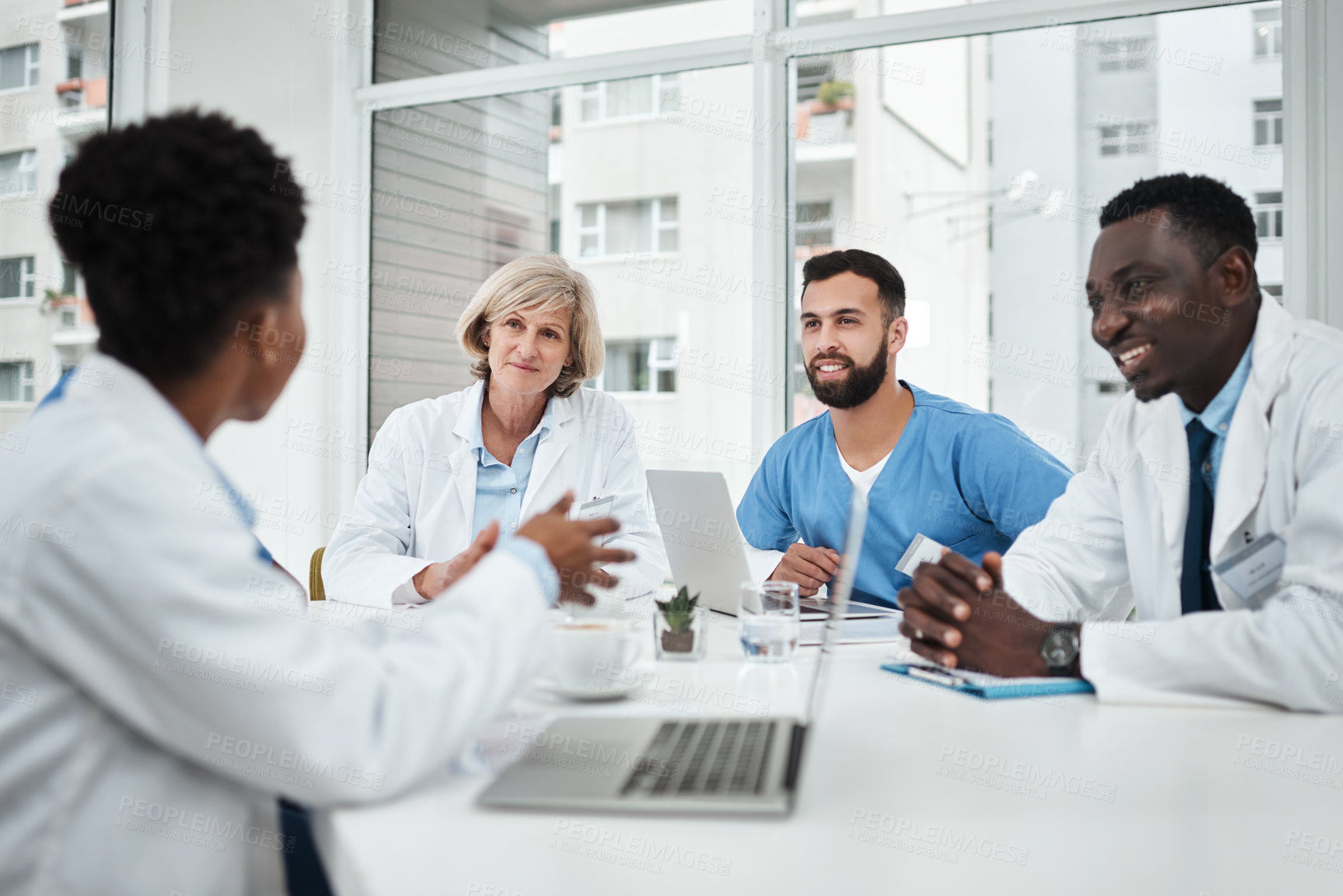 Buy stock photo Doctor, team and happy with meeting in boardroom for healthcare diagnosis, surgery planning and medical workshop. Medicine, professional and nurse with technology for health assessment and treatment