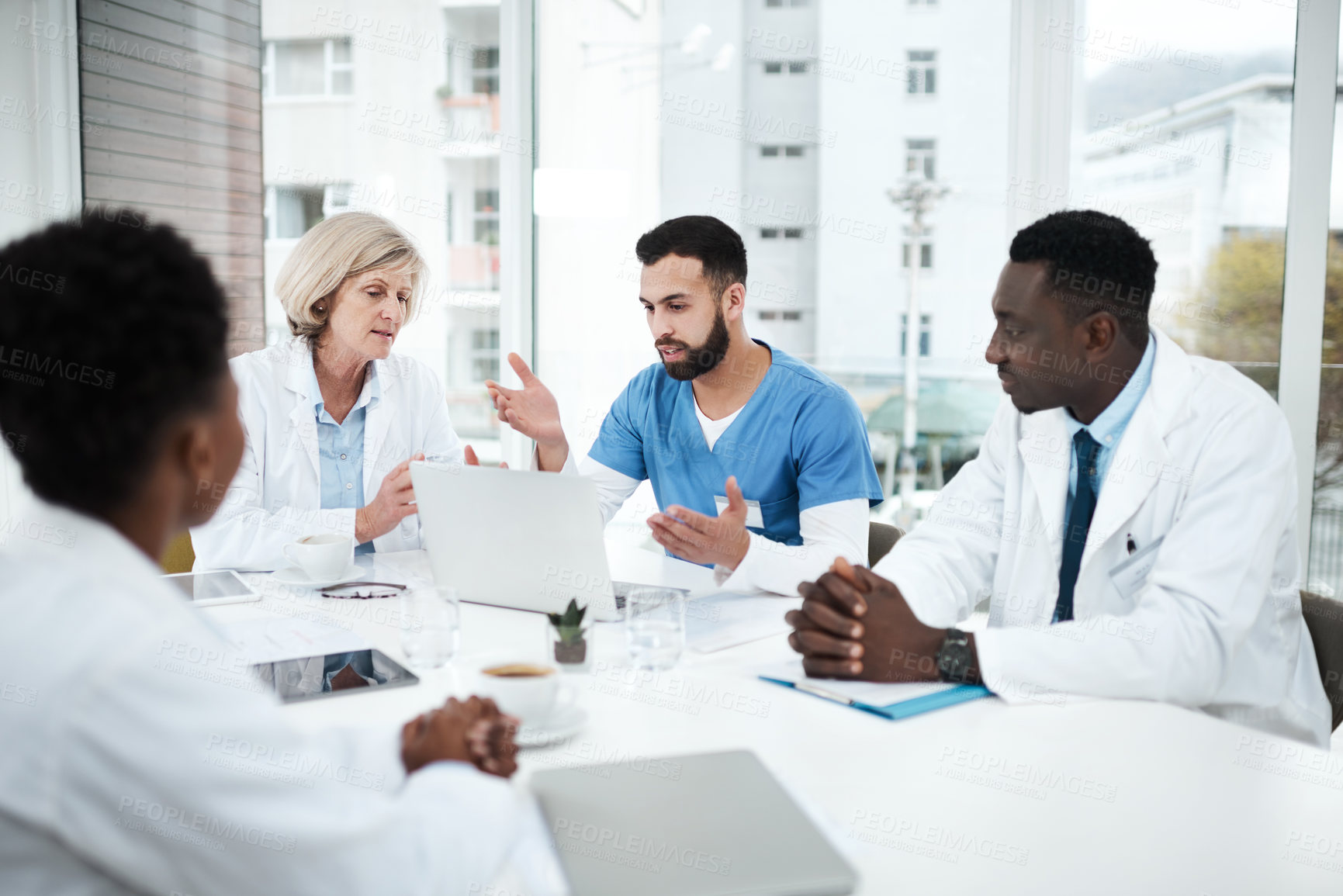 Buy stock photo Doctor, people and laptop with meeting in office for healthcare diagnosis, surgery planning or medical workshop. Medicine, professional and teamwork with discussion for health assessment or treatment