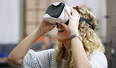 Buy stock photo VR, futuristic and curious woman in the metaverse, digital or virtual reality in a technology agency or startup company. Smile, future and person happy to use internet, online and 3D web tech