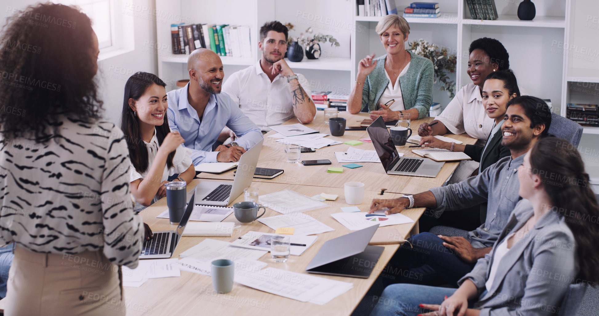 Buy stock photo Shot of a group of businesspeople having a meeting in a modern office