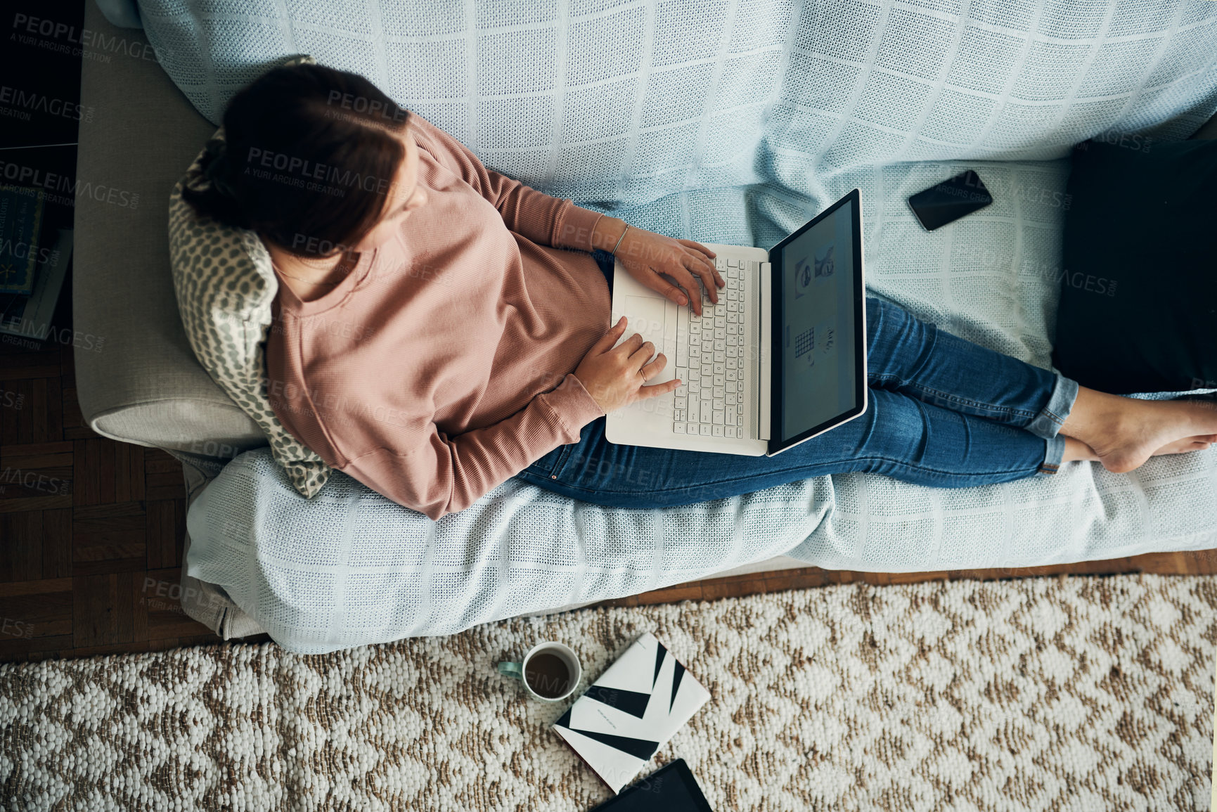 Buy stock photo Remote work, top view and woman on laptop in home for photo editing with post production software. Computer, freelancer and girl on sofa above for retouching creative project and side hustle online