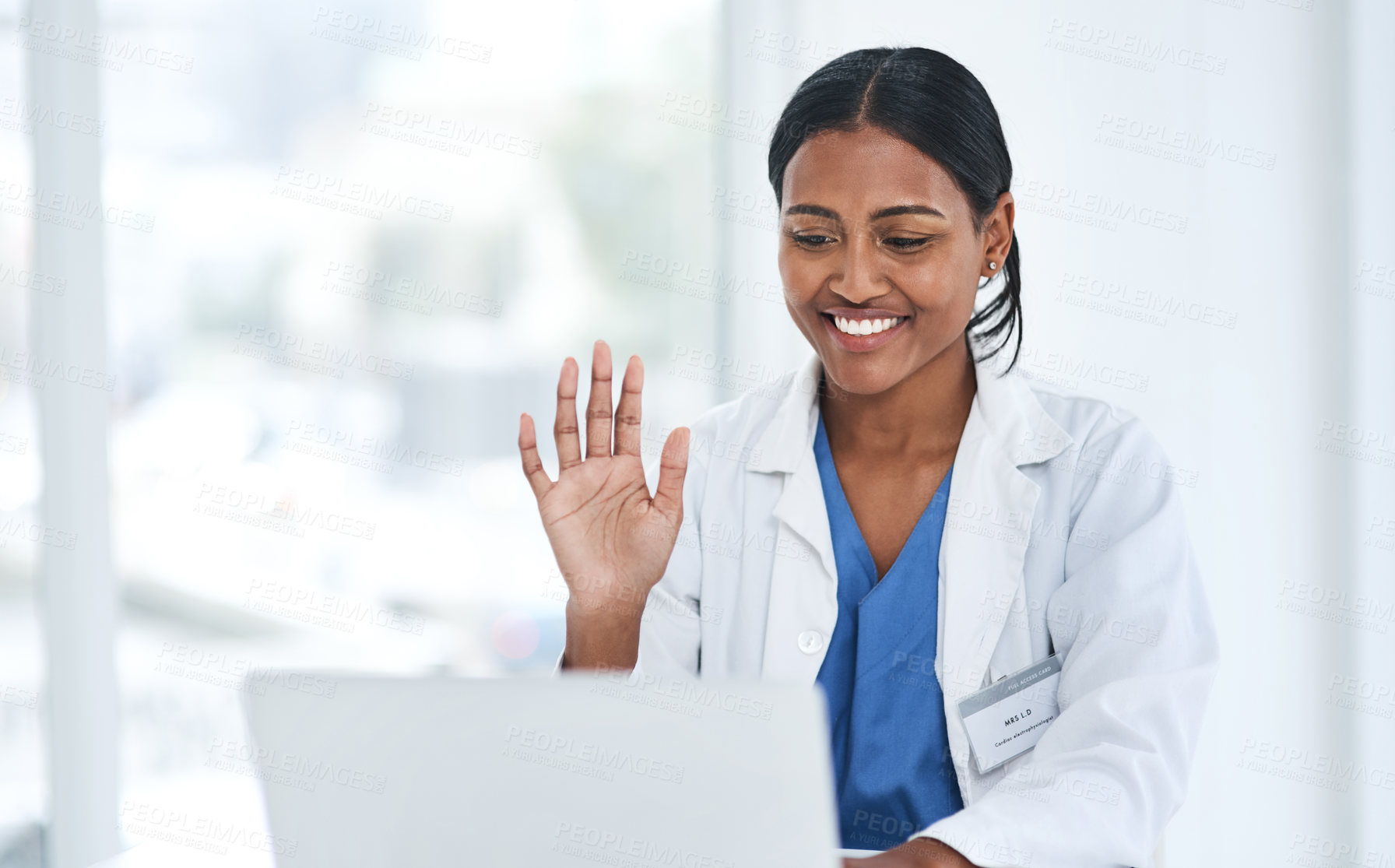 Buy stock photo Hand, hello and woman doctor on laptop video call for online consulting, help and advice in a hospital. Telehealth, hi and female healthcare expert on virtual consult or medical conference on space