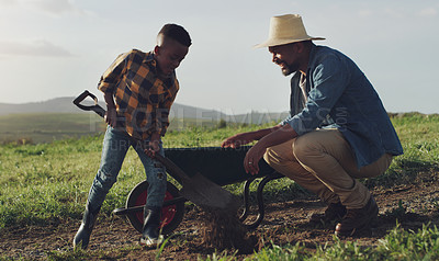 Buy stock photo Farm, agriculture and father and child help for farming, planting vegetables and dig in soil. Black family, nature and dad with young boy for sustainability, growth and agribusiness in countryside