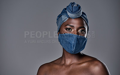 Buy stock photo Shot of a beautiful young woman wearing a denim head wrap and mask