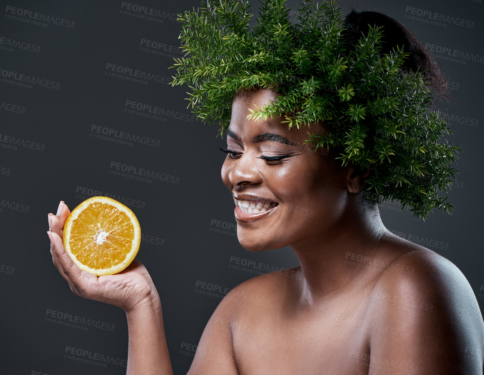 Buy stock photo Skincare, leaves and black woman with citrus in studio for beauty, organic cosmetics and anti aging. Happy, dark background and person with fruit for vitamin c, antioxidants and hydration for glow