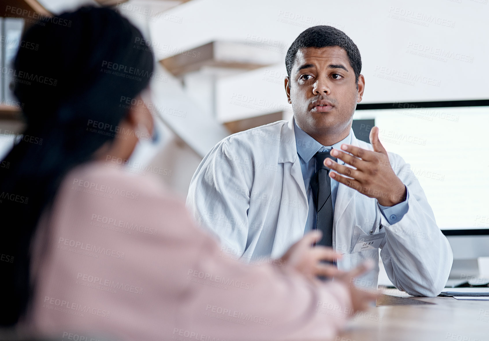 Buy stock photo Doctor talking to patient in medical consultation, checkup and consult in clinic, hospital and healthcare center. Professional, gp and specialist worker explaining symptoms and side effects to woman