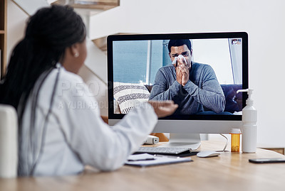 Buy stock photo Shot of a young man blowing his nose during a video call with a doctor on a computer