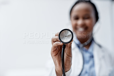 Buy stock photo Closeup shot of a young doctor holding a stethoscope