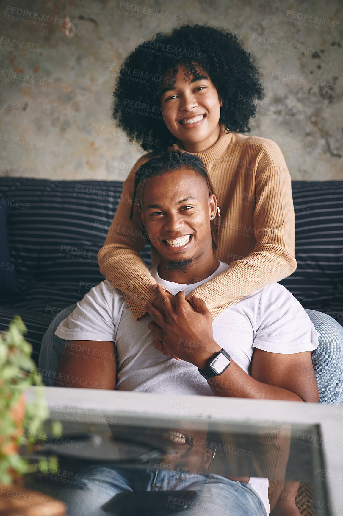 Buy stock photo Love, portrait and hug with couple on sofa for smile, support and bonding together. Happiness, loyalty and peace with African man and woman in living room of home for calm, connection or trust