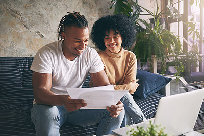 Buy stock photo Home, budget and happy couple on couch with laptop, rent application or paperwork for tax report. Research, man and woman on sofa with document, mortgage contract or online app for financial planning