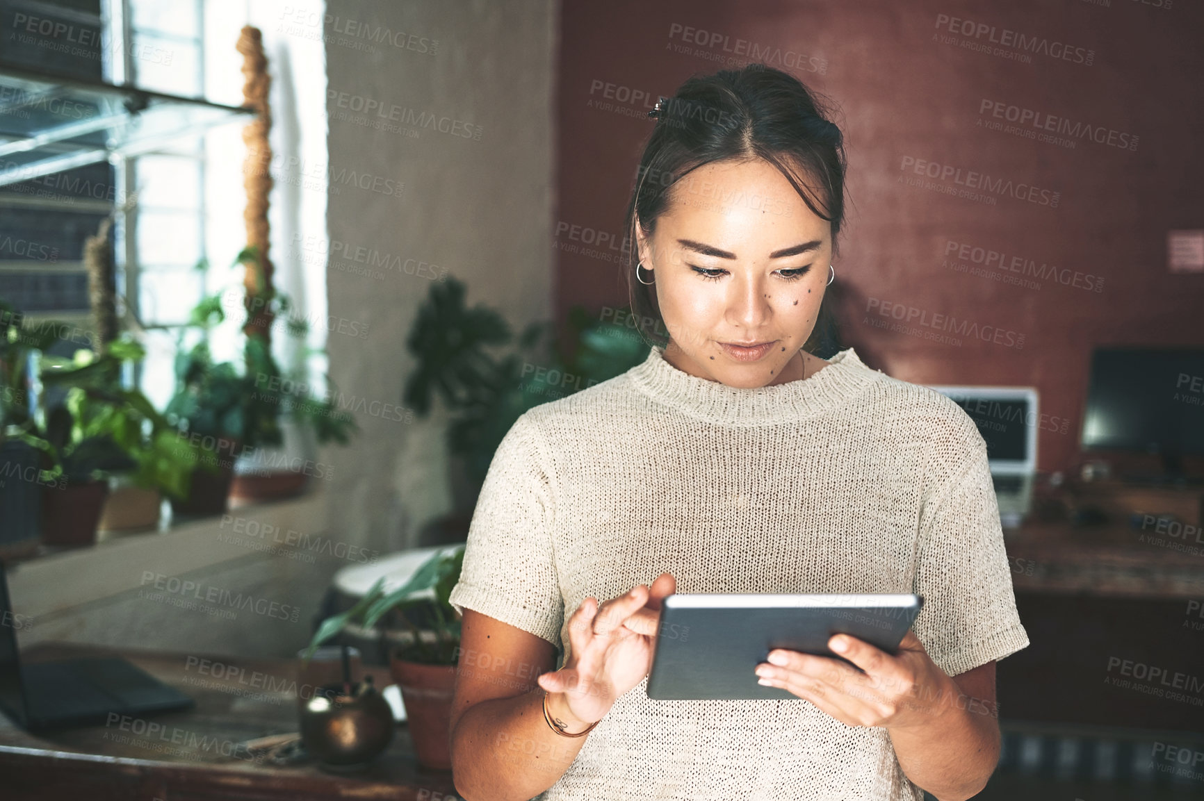 Buy stock photo Woman, research and tablet in workshop for pottery blog, social media post and website inventory. Sculpture artist, order or designer on mobile app with online ratings, sales review and selling craft