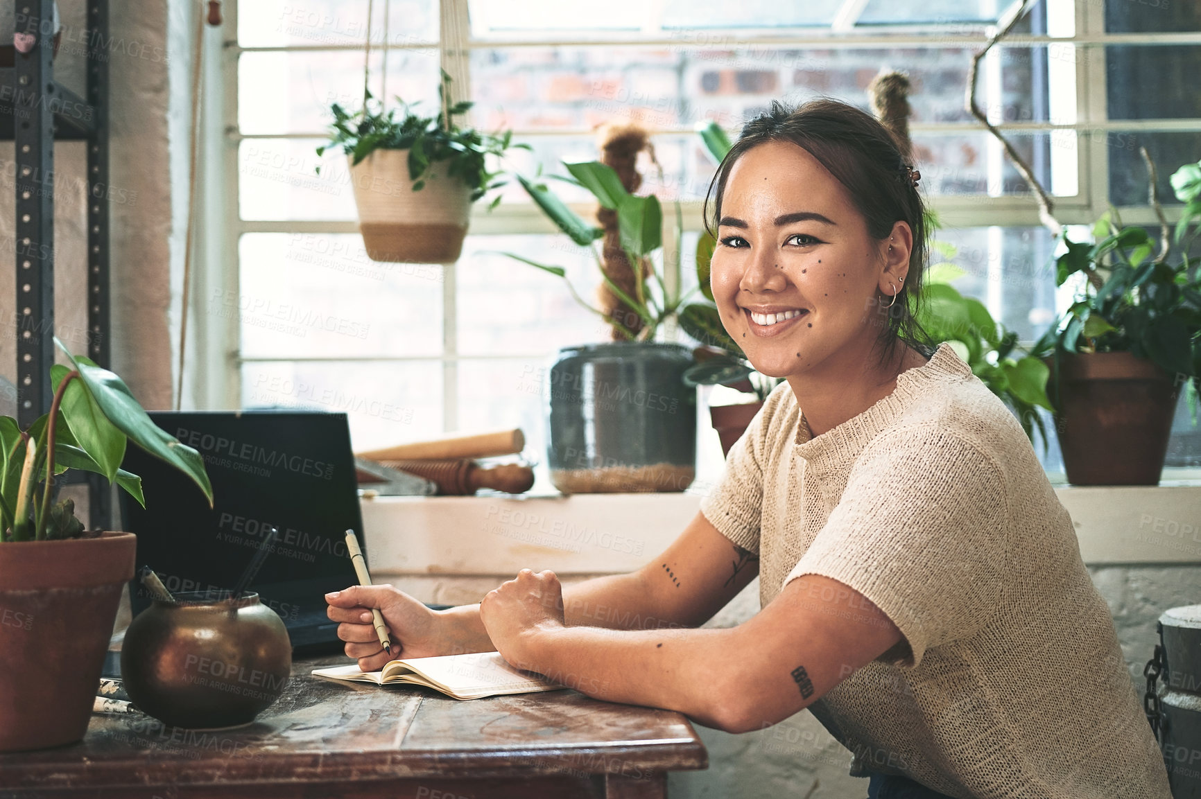 Buy stock photo Asian woman, portrait and florist with book for online order, schedule or small business startup at floral store. Happy, female person or environmentalist with smile for pottery design at eco shop