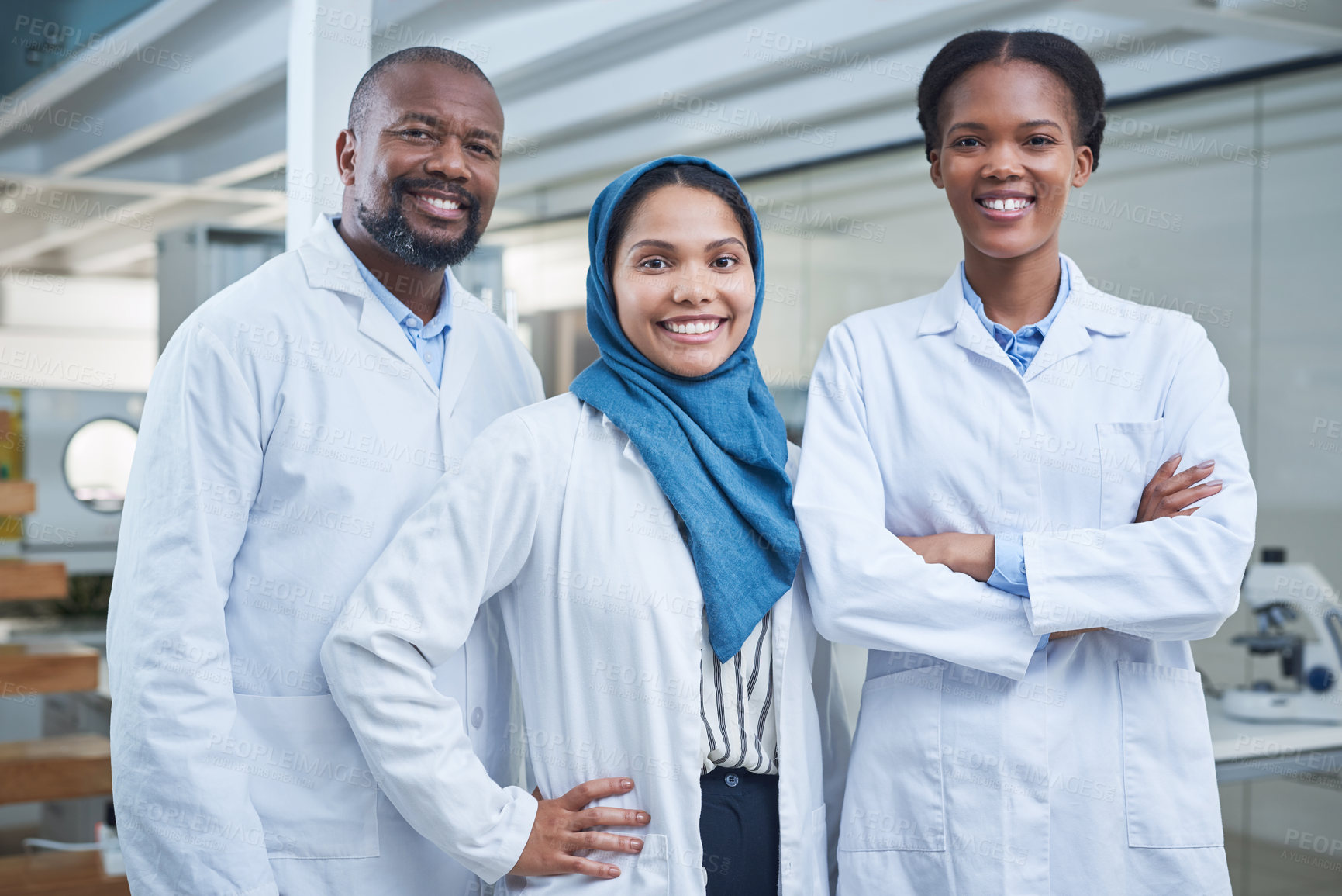 Buy stock photo Portrait of a group of scientists working in a lab