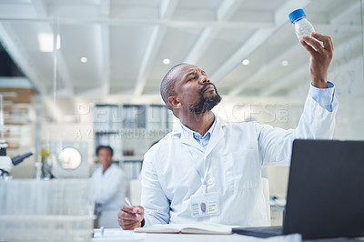 Buy stock photo Shot of a mature scientist working in a lab