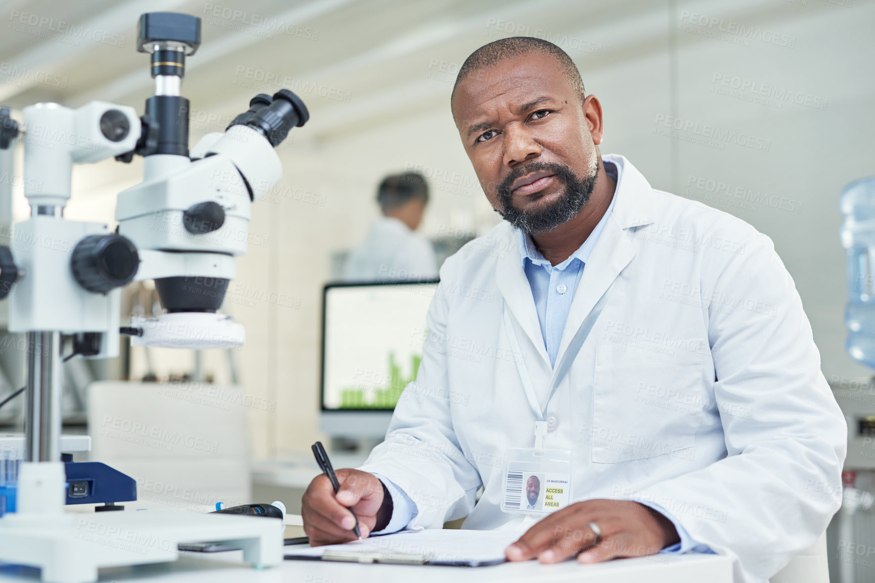 Buy stock photo Portrait of a mature scientist working in a lab