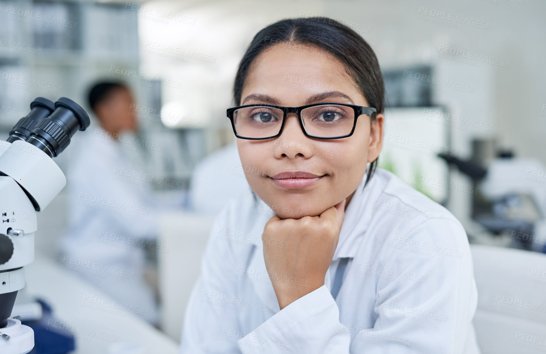 Buy stock photo Portrait of a young scientist working in a lab