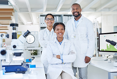Buy stock photo Portrait of a group of scientists working in a lab
