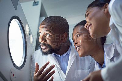 Buy stock photo Show of a group of scientists working in a lab