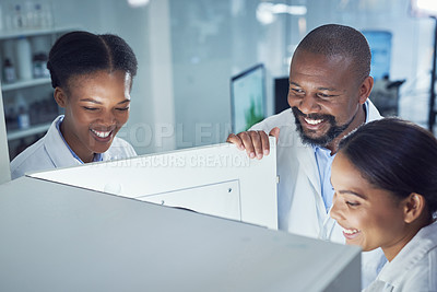 Buy stock photo Show of a group of scientists working in a lab