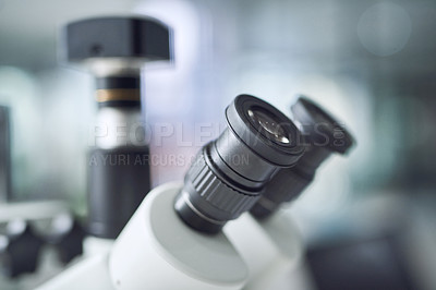 Buy stock photo Shot of a microscope in a modern laboratory
