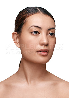 Buy stock photo Shot of a beautiful young woman posing against a white background