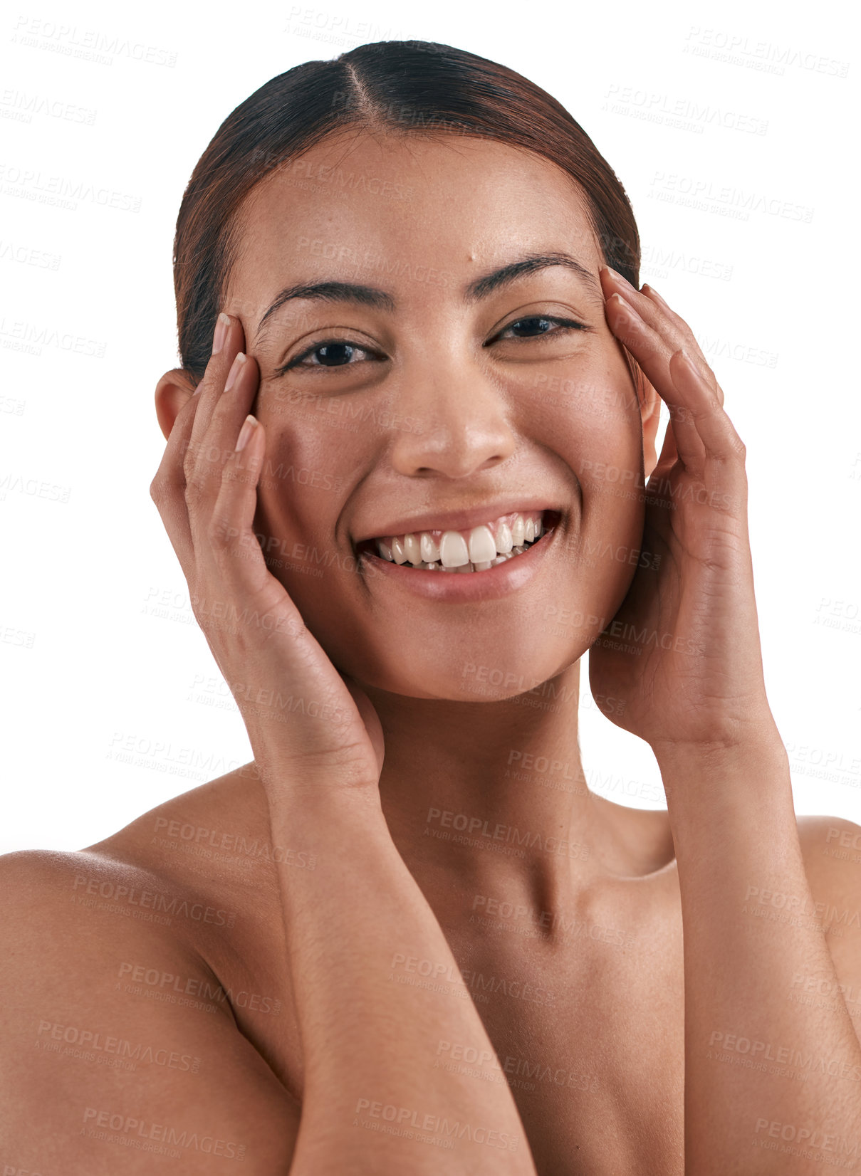 Buy stock photo Shot of a beautiful young woman touching her face while standing against a white background