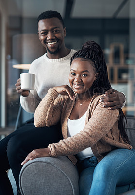 Buy stock photo Cropped shot of an affectionate young couple spending a relaxing day at home together