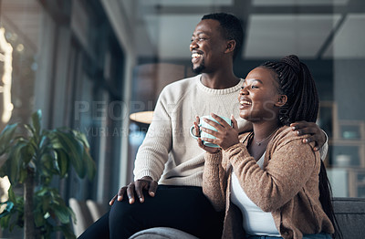 Buy stock photo Cropped shot of an affectionate young couple spending a relaxing day at home together