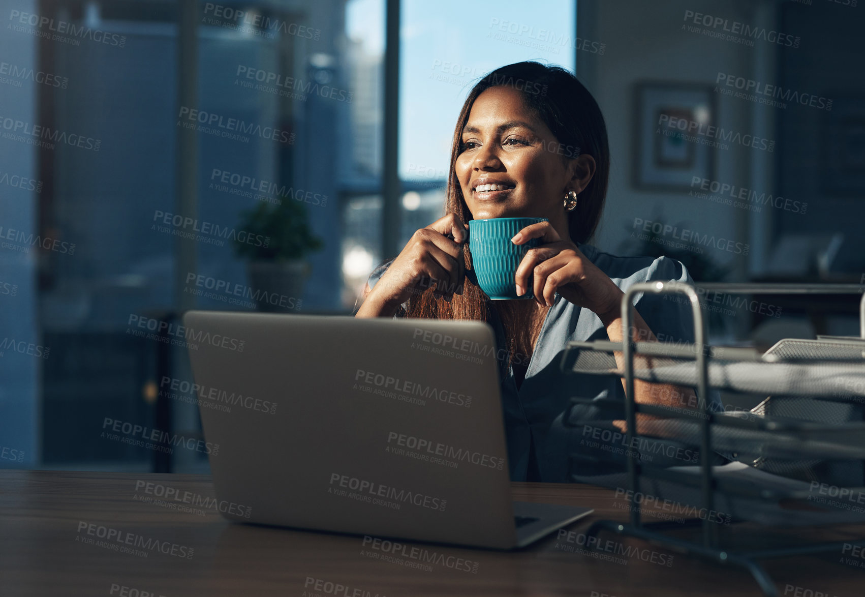 Buy stock photo Shot of a young businesswoman looking thoughtful while working in an office