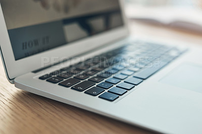 Buy stock photo Still life shot of a laptop on a table in an office