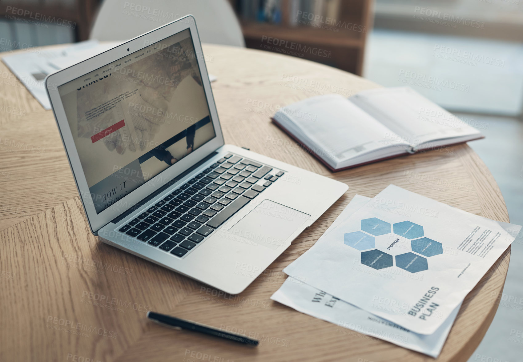 Buy stock photo Still life shot of a laptop and paperwork on a table in an office