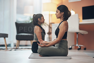 Buy stock photo Friends, meditation and women exercise together in a house with mindfulness, health and wellness. Indian sisters or female family meditate in a lounge for yoga workout, lotus and fitness with partner