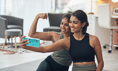 Buy stock photo Fitness, friends and strong muscle selfie of women together at home for social media memory or post. Indian sisters or female family with photo for influencer update, workout motivation or results