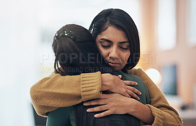 Buy stock photo Friends, hug and support of women together in a house with love, care and empathy. Indian sisters or female family in a room while sad, depressed and hugging for comfort, trust and quality time