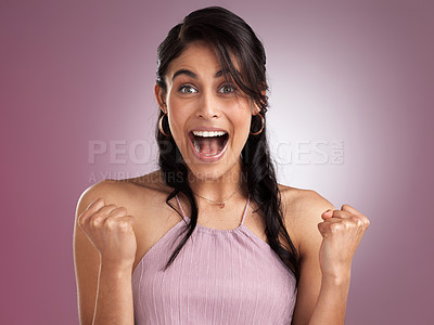 Buy stock photo Shot of a beautiful young cheerful woman celebrating against a pink background