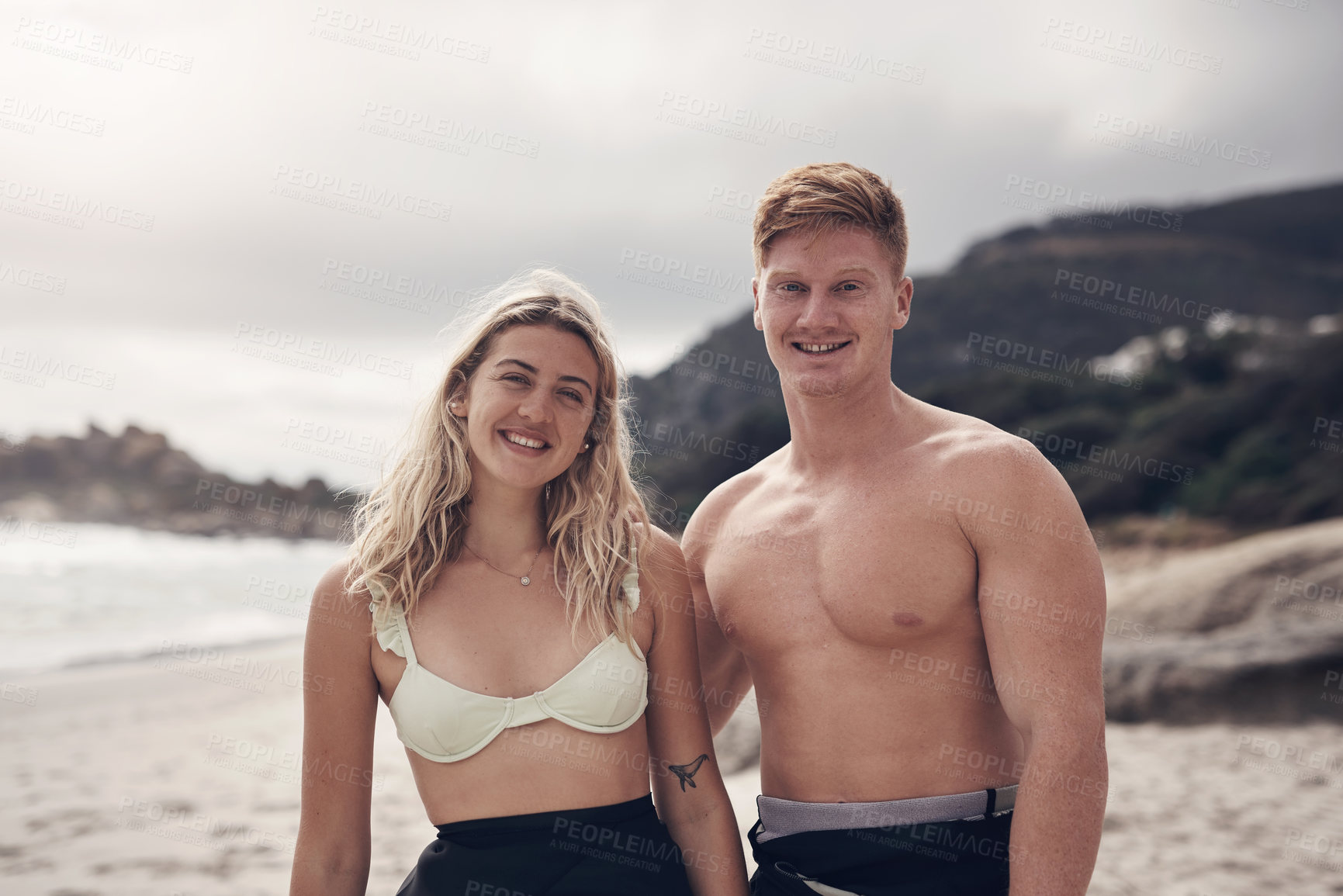 Buy stock photo Shot of a couple spending the day at the beach