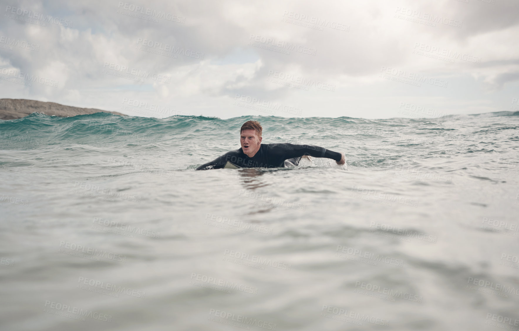 Buy stock photo Swimming, surfer and man in ocean water for fitness, exercise and practice with waves on holiday. Stroke, surfboard and person surfing at sea for sports, adventure and workout on vacation outdoor