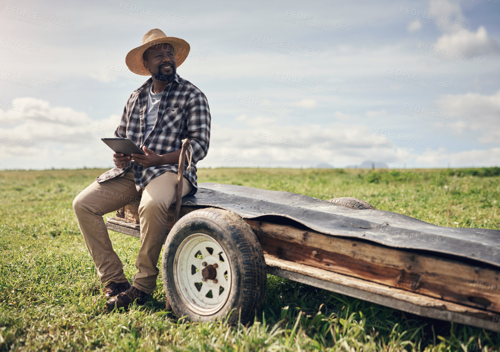 Buy stock photo Tablet, thinking and trailer with black man on farm for online agriculture or sustainability management. App, ideas and research with mature African farmer outdoor for agribusiness development