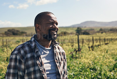 Buy stock photo Shot of a mature man working on a farm