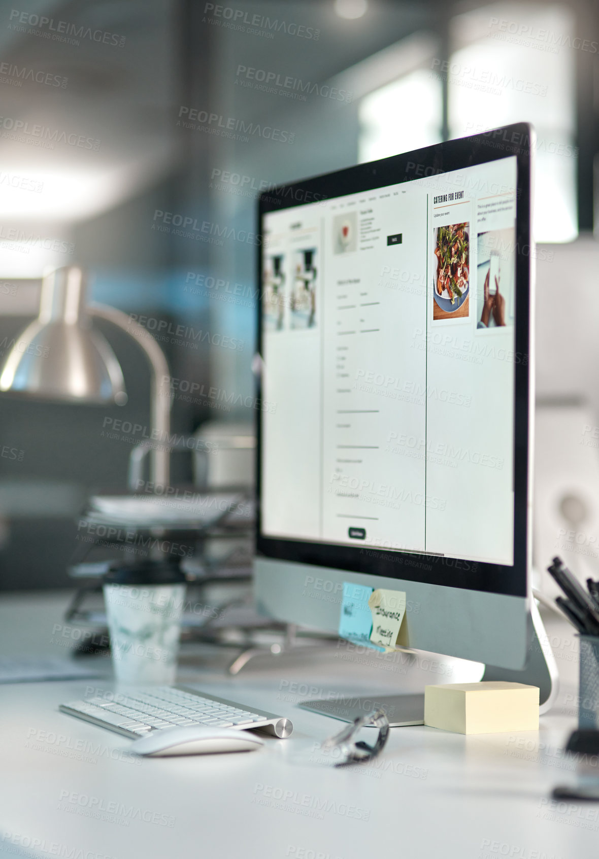 Buy stock photo Angled shot of a desktop computer on a desk in a modern office