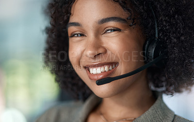 Buy stock photo Cropped shot of a young female agent smiling with her headset on while working in a call centre