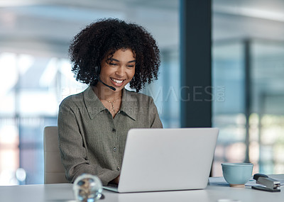 Buy stock photo Shot of a young female agent enjoying an interaction with a client while working in a call centre