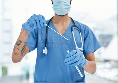 Buy stock photo Closeup shot of an unrecognisable medical practitioner holding a sampling swab