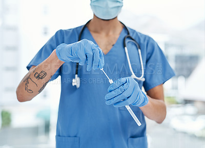 Buy stock photo Closeup shot of an unrecognisable medical practitioner holding a sampling swab