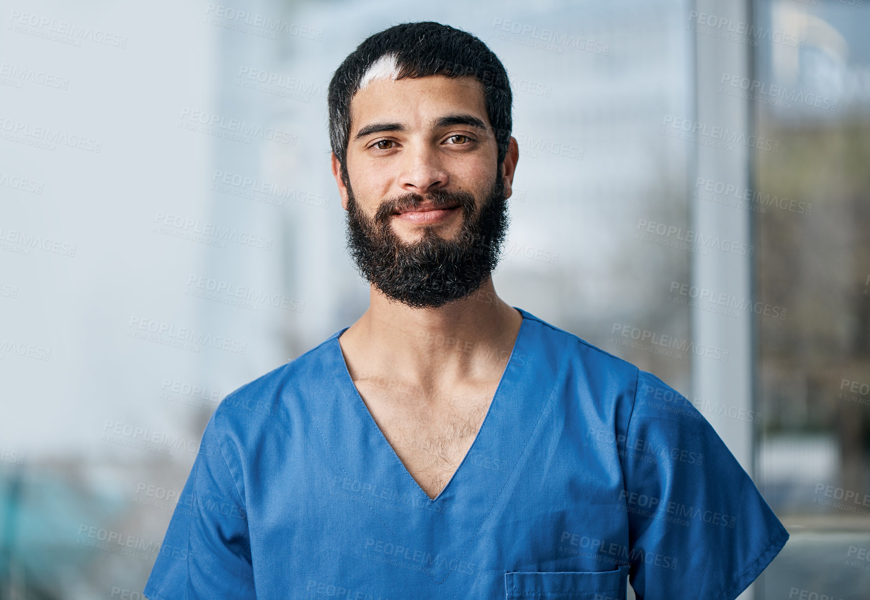 Buy stock photo Portrait of a medical practitioner standing in a hospital