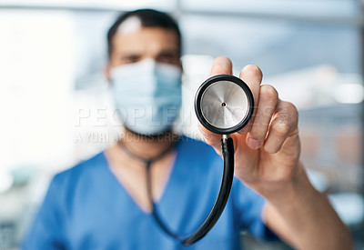 Buy stock photo Closeup shot of a medical practitioner holding a stethoscope