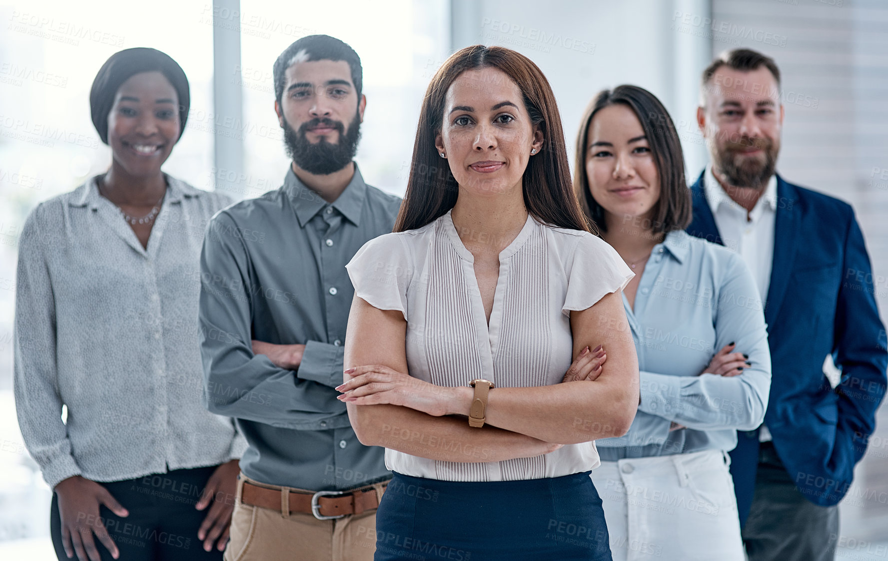 Buy stock photo Portrait of a group of businesspeople standing together in an office