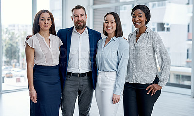 Buy stock photo Portrait of a group of businesspeople standing together in an office